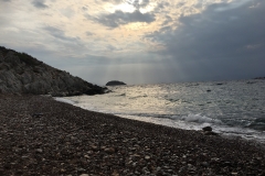 Mirror of light breaking clouds
