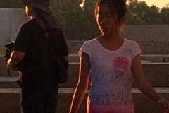 Window into girl walking