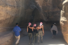 Window into women walking in the Siq at Petra